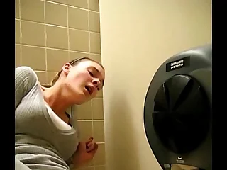 Naughty hottie fingering in toilet